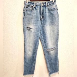 Vici jeans distressed style.